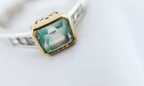 Jeweller working at bench